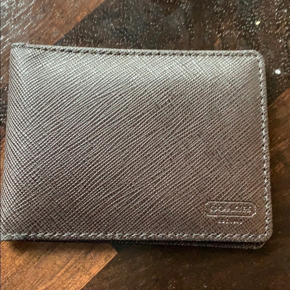 Small mens Coach wallet.  Never used.
